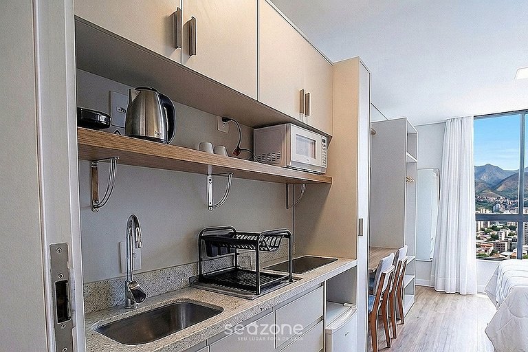 Studio em Cond. c/ Garagem e Vista Cid. USTB0503