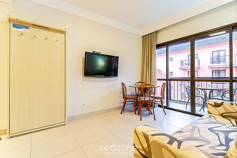 Suíte luxuosa em resort pé na areia
