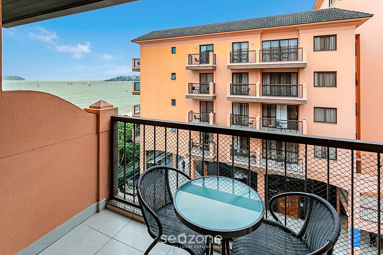 Suíte luxuosa em resort pé na areia