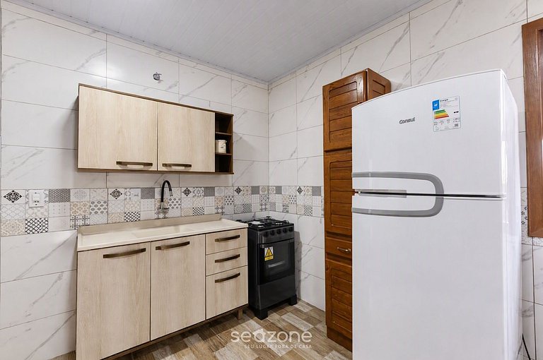 Casa Bem localizada c/ churrasq. TOU0497