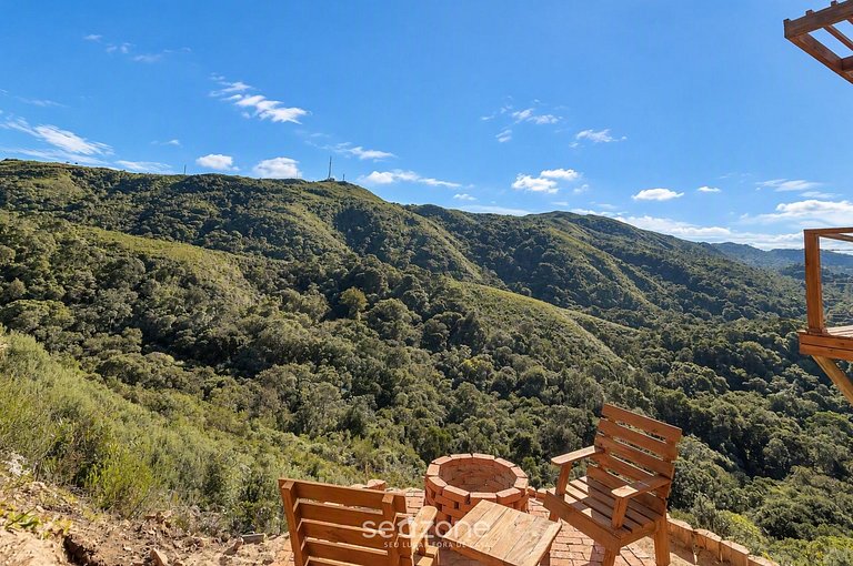 Cabaña con hidromasaje y vista a la montaña VST030