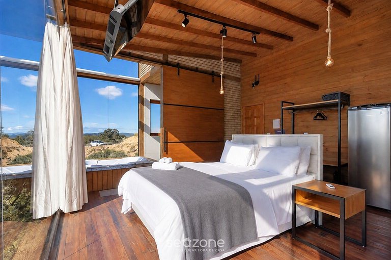 Cabaña con hidromasaje y vista a la montaña VST030